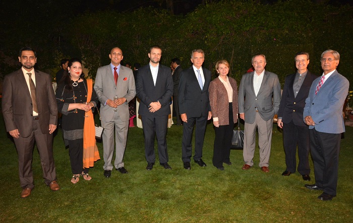Ambassador of Argentina, Rodolfo J. Martin-Saravia (third right), statesman Aitezaz Ahsan (extreme right) with other guests at the event marking 60th anniversary of Pakistan and Cuba diplomatic ties.