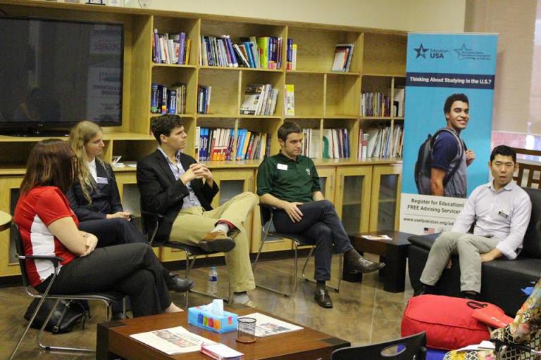 Representatives of U.S. universities discussing U.S. study options with Pakistani students