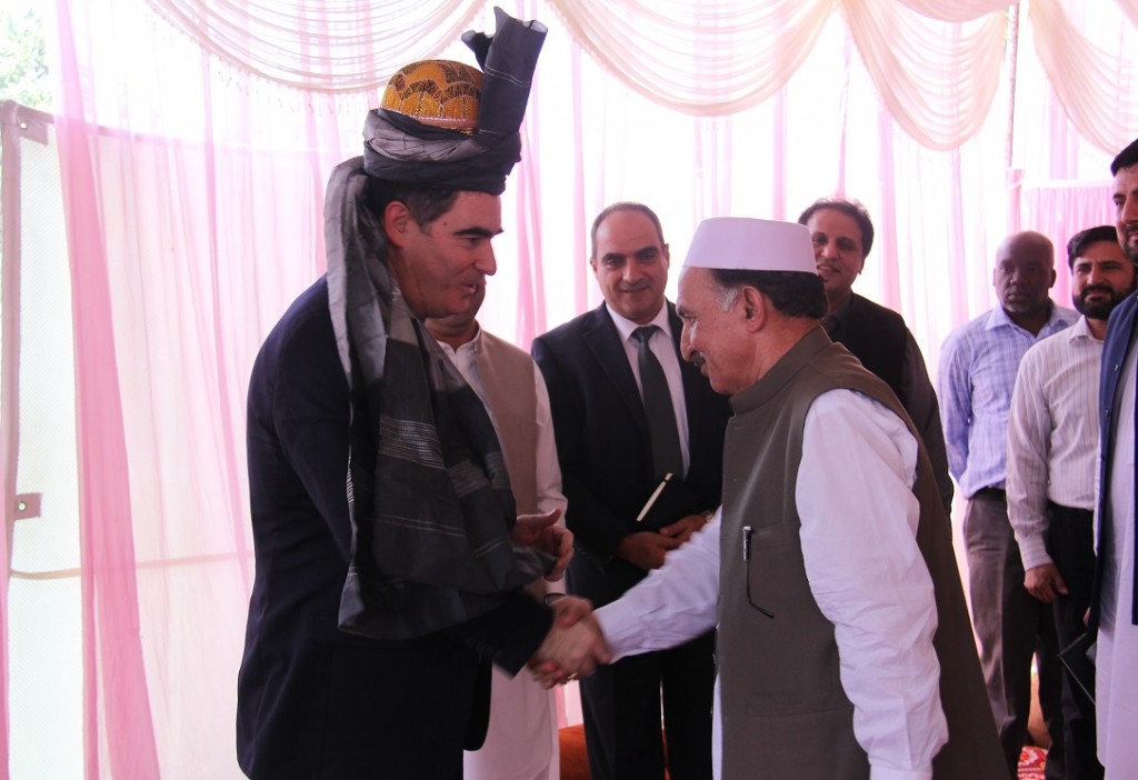 Director of Operations OCHA John Ging being presented with a ceremonial turban (qulla) at the jirga meeting