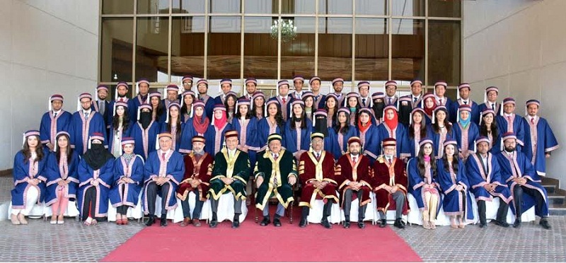 President Mamnoon Hussain in a group photo with gold medalists and degree holders on the occasion of 3rd convocation of Shifa Tameer-e-Millat University at Jinnah Convention Centre, Islamabad on December 30, 2015