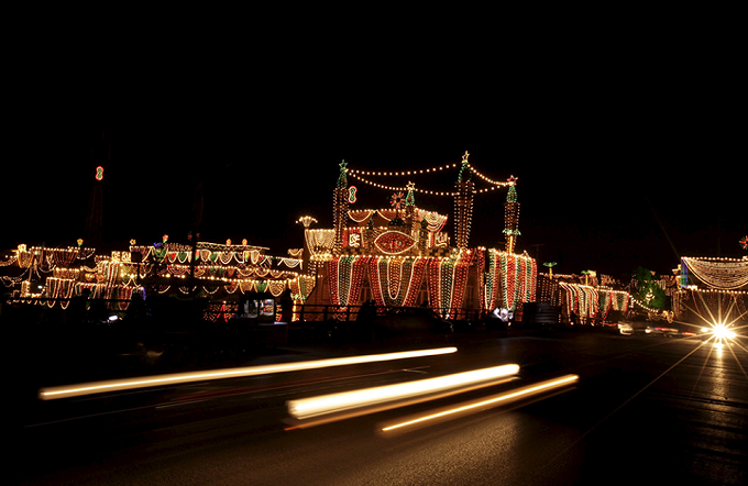 Vehicles drive past a mosque illuminated during a celebration to mark Eid-e-Milad-ul-Nabi in Rawalpindi. Photo: Reuters