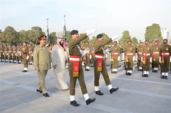 Saudi defence minister reviewing guard of honour on his arrival at GHQ.