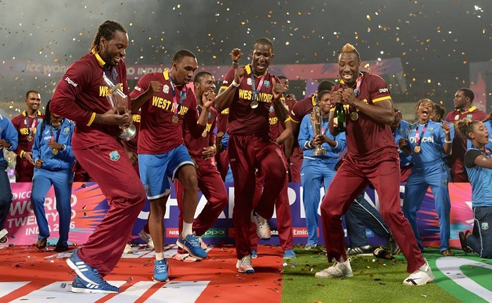 West Indies men’s and women’s players celebrate after their respective wins in the finals of the ICC World Twenty20 2016 cricket tournament at Eden Gardens in Kolkata, India, Sunday, April 3, 2016