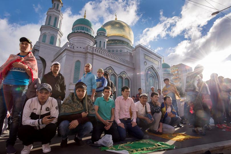 Muslims gather to offer prayers at the central mosque in Moscow on July 5, 2016, during celebrations for Eid al-Fitr marking the end of the Islamic holy month of Ramadan. Photo: Alexander Utkin/AFP/Getty Images