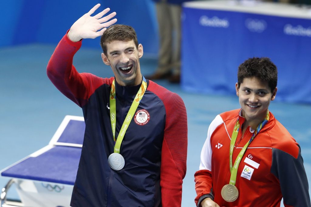 Singapore's Joseph Schooling beat his idol Michael Phelps to win gold in the men's 100m butterfly final at the Olympic games in Rio.