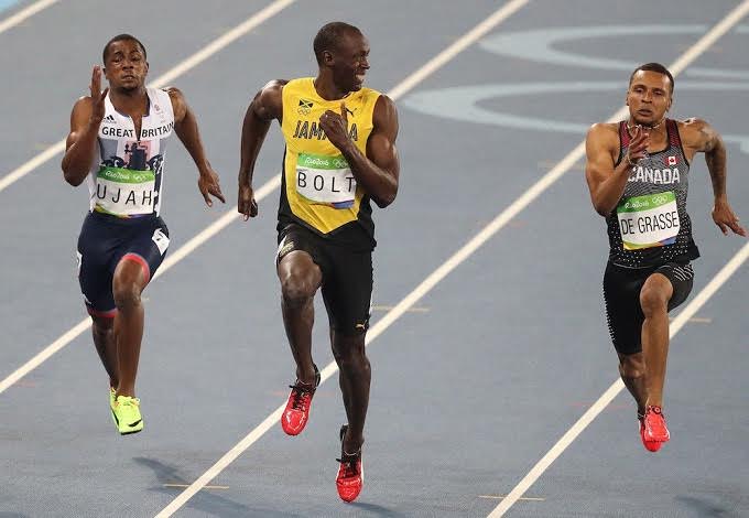 Athletes including Usain Bolt of Jamaica (C) compete in the Men's 100 meter semifinal of the Rio 2016 Olympic Games in Rio de Janeiro, Brazil on on August 14, 2016. Photo: Salih Zeki Fazlioglu/Anadolu Agency/Getty Images