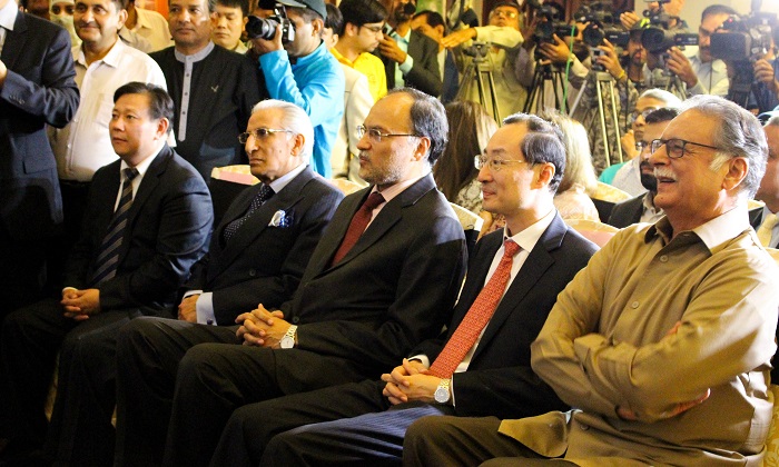 (R to L) Information Minister Pervez Rashid, Chinese Ambassador Sun Weidong, Minister Ahsan Iqbal and Mr. Tariq Fatemi at joint exhibition by Pakistani and Chinese artists at PNCA in Islamabad on 18 Oct. 2016.