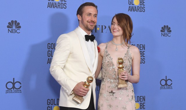 'La La Land' stars, Ryan Gosling and Emma Stone, with their awards at Golden Globe 2017