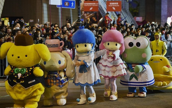 People dressed as cartoon figures participate in the Cathay Pacific International Chinese New Year Night Parade in Hong Kong, south China, Jan. 28, 2017. Photo: Xinhua/Wang Shen