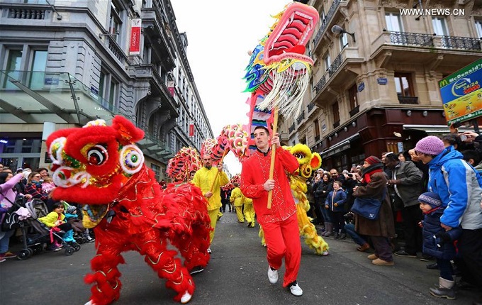 People take part in the Chinese Lunar New Year Parade in downtown Brussels, Belgium, on Jan. 28, 2017. Photo: Xinhua/Gong Bing