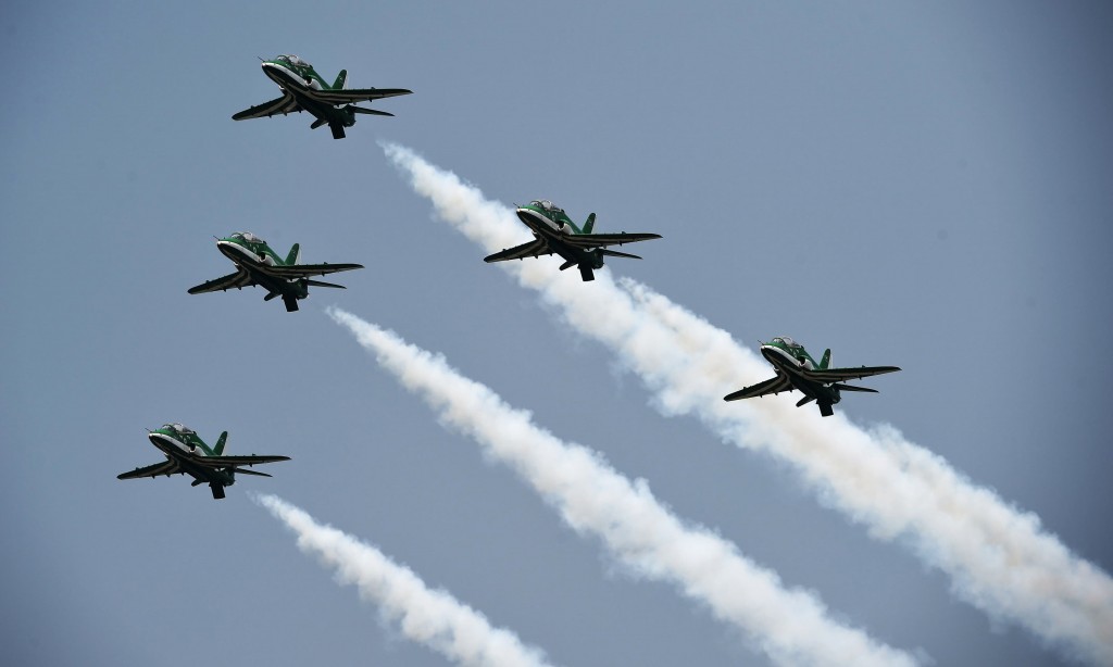 An aerobatic team performs during a rehearsal ahead of Independence day celebrations. —AFP