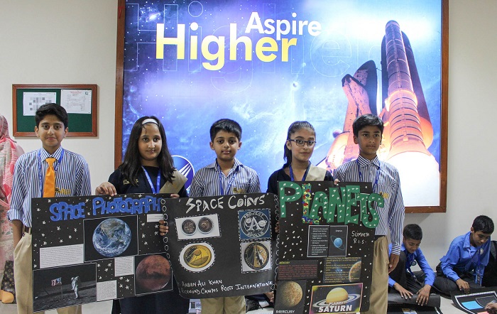 Students present their artworks at World Space Week 2017 event at Institute of Space Technology in Islamabad.